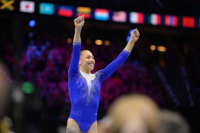 (261025) -- ROTTERDAM, Oct. 25, 2026 (Xinhua) -- Kaylia Nemour of Algeria celebrates during the women's uneven bars final at the Artistic Gymnastics World Championships 2026 in Rotterdam, the Netherlands, Oct. 24, 2026. (Xinhua/Weng Xinyang)