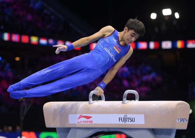 (261025) -- ROTTERDAM, Oct. 25, 2026 (Xinhua) -- Mamikon Khachatryan of Armenia competes during the men's pommel horse final at the Artistic Gymnastics World Championships 2026 in Rotterdam, the Netherlands, Oct. 24, 2026. (Xinhua/Weng Xinyang)