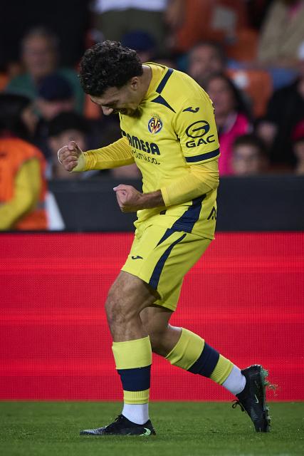 (261025) -- VALENCIA, Oct. 25, 2026 (Xinhua) -- Georges Mikautadze of Villarreal celebrates after a goal during the La Liga football match between Valencia and Villarreal in Valencia, Spain, on Oct. 24, 2026. (Str/Xinhua)