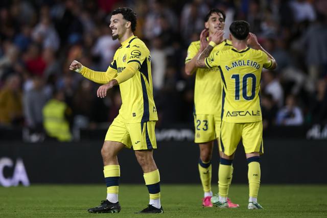 (261025) -- VALENCIA, Oct. 25, 2026 (Xinhua) -- Georges Mikautadze (L) of Villarreal celebrates a goal during the La Liga football match between Valencia and Villarreal in Valencia, Spain, on Oct. 24, 2026. (Str/Xinhua)