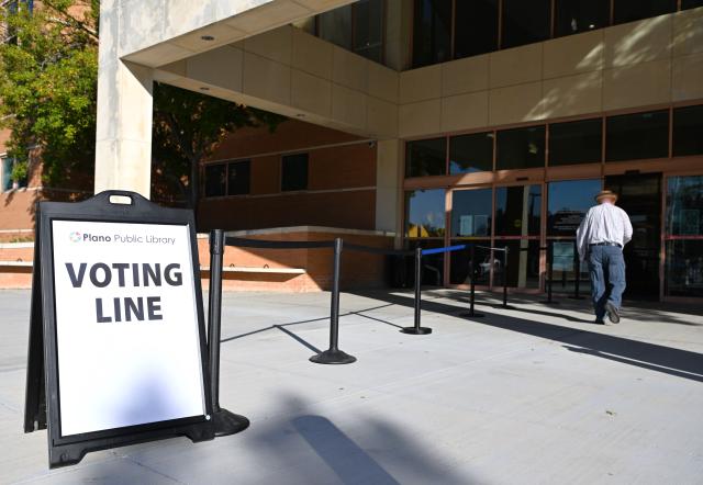 (261025) -- PLANO, Oct. 25, 2026 (Xinhua) -- A man enters a polling station after early voting for the Nov. 3 U.S. midterm elections started, in Plano, Texas, the United States, on Oct. 24, 2026. (Xinhua/Li Rui)