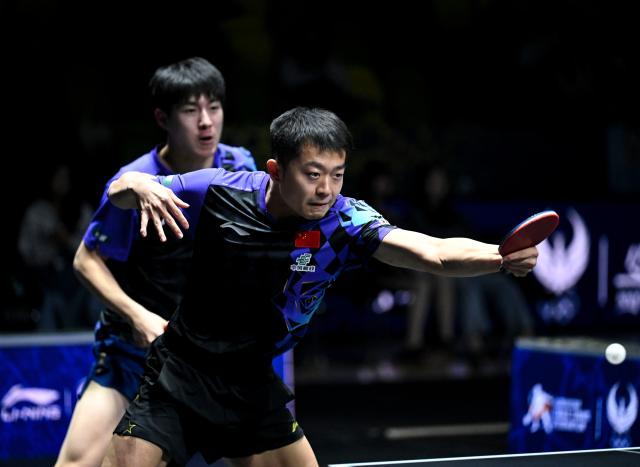 (261025) -- TASHKENT, Oct. 25, 2026 (Xinhua) -- Wen Ruibo/Yuan Licen (R) of China compete during the men's doubles semifinals against Wong Chun Ting/Chan Baldwin of China's Hong Kong at the 29th ITTF-Asian Table Tennis Championships in Tashkent, Uzbekistan, Oct. 25, 2026. (Xinhua/Feng Kaihua)