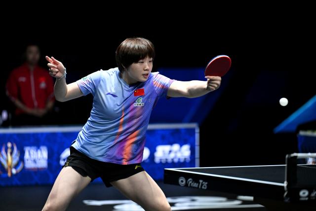 (261025) -- TASHKENT, Oct. 25, 2026 (Xinhua) -- Kuai Man of China hits a return during the women's singles semifinal against Harimoto Miwa of Japan at the 29th ITTF-Asian Table Tennis Championships in Tashkent, Uzbekistan, Oct. 25, 2026. (Xinhua/Feng Kaihua)