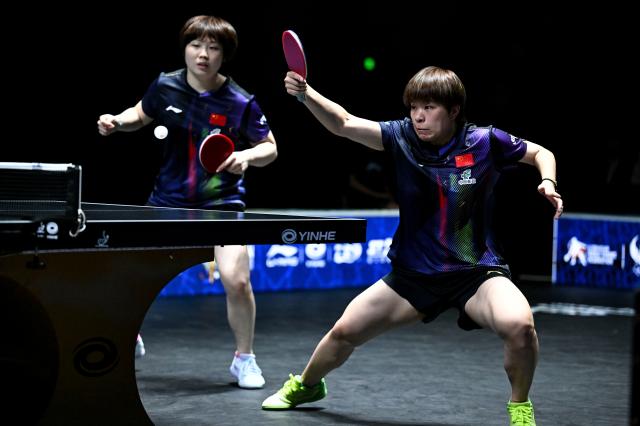 (261025) -- TASHKENT, Oct. 25, 2026 (Xinhua) -- Kuai Man/Wang Yidi (R) of China compete during the women's doubles final against Harimoto Miwa/Hayata Hina of Japan at the 29th ITTF-Asian Table Tennis Championships in Tashkent, Uzbekistan, Oct. 25, 2026. (Xinhua/Feng Kaihua)