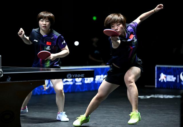 (261025) -- TASHKENT, Oct. 25, 2026 (Xinhua) -- Kuai Man/Wang Yidi (R) of China compete during the women's doubles final against Harimoto Miwa/Hayata Hina of Japan at the 29th ITTF-Asian Table Tennis Championships in Tashkent, Uzbekistan, Oct. 25, 2026. (Xinhua/Feng Kaihua)