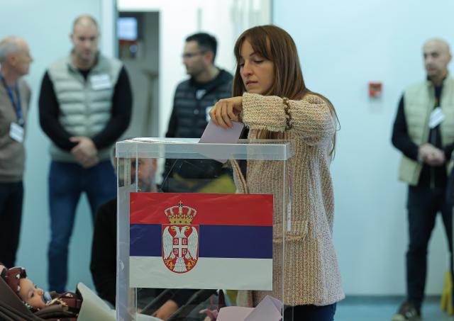 (261025) -- BELGRADE, Oct. 25, 2026 (Xinhua) -- A woman casts her ballot for the early parliamentary election at a polling station in Belgrade, Serbia, on Oct. 25, 2026. Polling stations opened across Serbia at 7 a.m. local time (0600 GMT) on Sunday in snap parliamentary elections to elect the country's 250-seat National Assembly. (Photo by Predrag Milosavljevic/Xinhua)