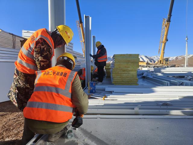 (261025) -- BAQEN, Oct. 25, 2026 (Xinhua) -- Rescuers from the China Railway 20th Bureau Group Corporation Limited build prefabricated houses at a quake-hit village in Gangchen Township of Baqen County, Nagqu City, southwest China's Xizang Autonomous Region, Oct. 25, 2026. Rescue and relief efforts continue after a 7.0-magnitude earthquake struck Baqen County of the city of Nagqu in southwest China's Xizang Autonomous Region, local authorities said Saturday.
The roof panels of the first batch of prefabricated houses have been installed in Sunday afternoon in the quake-hit village in Gangchen Township of Baqen, and the laying of cables and the installation of doors and windows have been advanced successively. Currently, seven prefabricated houses have been basically completed. (Xinhua)