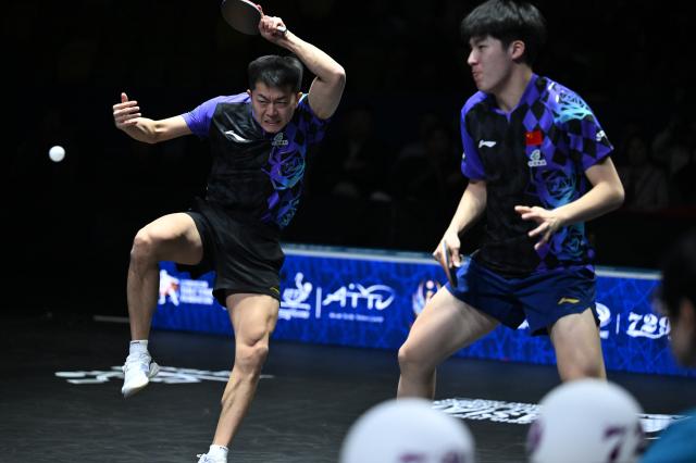 (261025) -- TASHKENT, Oct. 25, 2026 (Xinhua) -- Wen Ruibo/Yuan Licen (L) of China compete during the men's doubles final against Lin Shidong/Huang Youzheng of China at the 29th ITTF-Asian Table Tennis Championships in Tashkent, Uzbekistan, Oct. 25, 2026. (Xinhua/Feng Kaihua)
