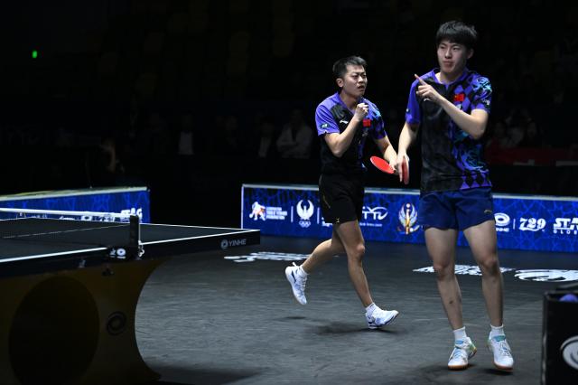 (261025) -- TASHKENT, Oct. 25, 2026 (Xinhua) -- Wen Ruibo/Yuan Licen (L) of China celebrate during the men's doubles final against Lin Shidong/Huang Youzheng of China at the 29th ITTF-Asian Table Tennis Championships in Tashkent, Uzbekistan, Oct. 25, 2026. (Xinhua/Feng Kaihua)