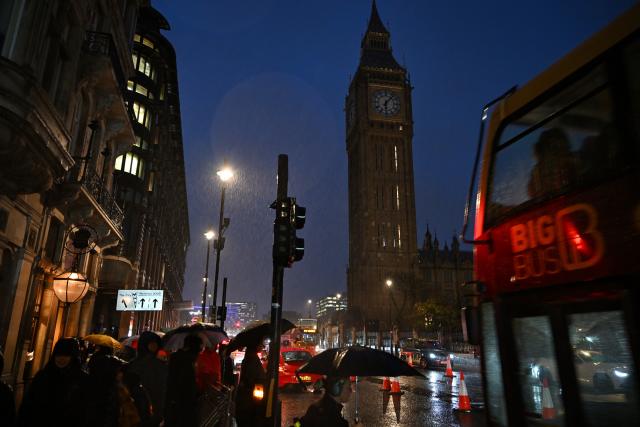 (261025) -- LONDON, Oct. 25, 2026 (Xinhua) -- This photo taken on the evening of Oct. 24, 2026 shows the Elizabeth Tower, commonly known as Big Ben, with its clock faces unlit for maintenance and time adjustments ahead of Britain's return to Greenwich Mean Time (GMT) in London, Britain. Britain ended British Summer Time (BST) at 2am on Sunday, October 25, 2026, setting clocks back one hour to Greenwich Mean Time (GMT). (Xinhua/Li Mangmang)