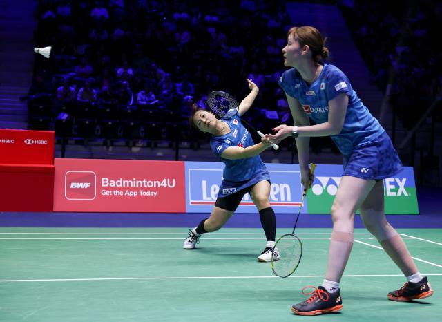 (261026) -- PARIS, Oct. 26, 2026 (Xinhua) -- Fukushima Yuki (L)/Matsumoto Mayu of Japan compete during the women's doubles final match between Fukushima Yuki/Matsumoto Mayu of Japan and Pearly Tan/Thinaah Muralitharan of Malaysia at the French Open badminton tournament in Paris, France, Oct. 25, 2026. (Xinhua/Wu Huiwo)