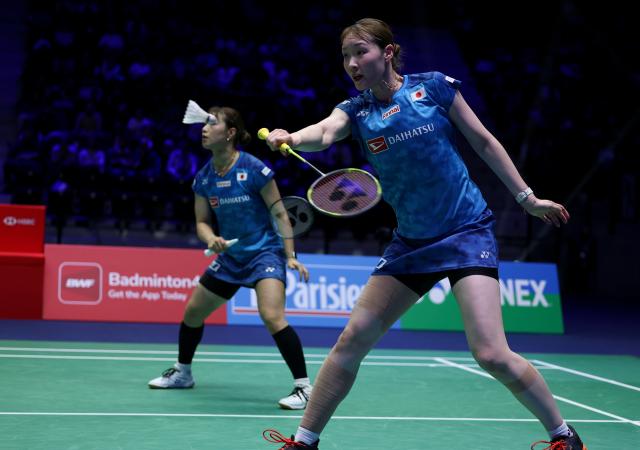 (261026) -- PARIS, Oct. 26, 2026 (Xinhua) -- Fukushima Yuki/Matsumoto Mayu (R) of Japan compete during the women's doubles final match between Fukushima Yuki/Matsumoto Mayu of Japan and Pearly Tan/Thinaah Muralitharan of Malaysia at the French Open badminton tournament in Paris, France, Oct. 25, 2026. (Xinhua/Wu Huiwo)
