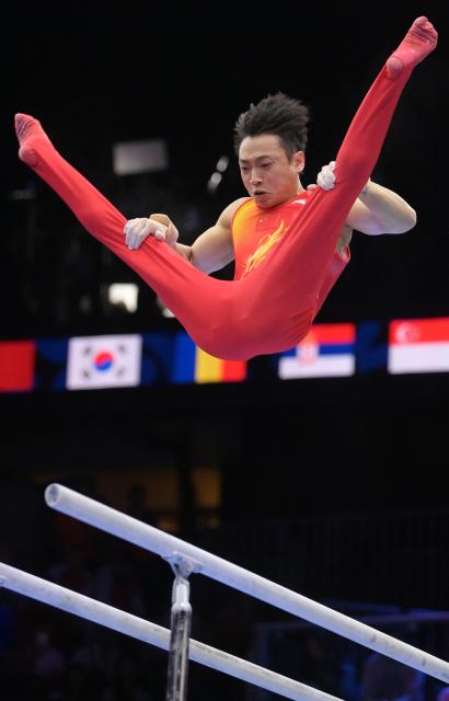 (261026) -- ROTTERDAM, Oct. 26, 2026 (Xinhua) -- Zou Jingyuan of China competes during the men's parallel bars final at the Artistic Gymnastics World Championships 2026 in Rotterdam, the Netherlands, Oct. 25, 2026. (Xinhua/Weng Xinyang)