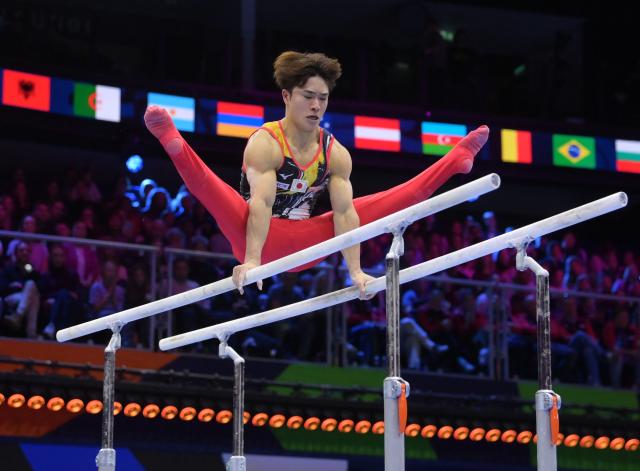 (261026) -- ROTTERDAM, Oct. 26, 2026 (Xinhua) -- Oka Shinnosuke of Japan competes during the men's parallel bars final at the Artistic Gymnastics World Championships 2026 in Rotterdam, the Netherlands, Oct. 25, 2026. (Xinhua/Weng Xinyang)