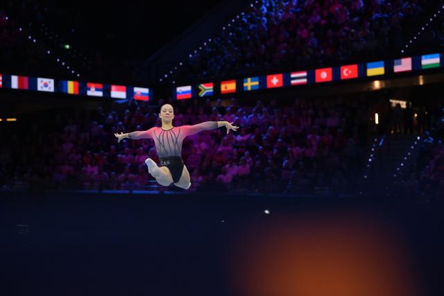 (261026) -- ROTTERDAM, Oct. 26, 2026 (Xinhua) -- Lia Grace Redick of Canada competes during the women's floor exercise final at the Artistic Gymnastics World Championships 2026 in Rotterdam, the Netherlands, Oct. 25, 2026. (Xinhua/Weng Xinyang)