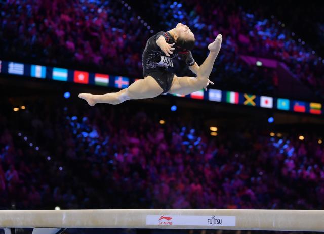 (261026) -- ROTTERDAM, Oct. 26, 2026 (Xinhua) -- Zhang Qingying of China competes during the women's balance beam final at the Artistic Gymnastics World Championships 2026 in Rotterdam, the Netherlands, Oct. 25, 2026. (Xinhua/Weng Xinyang)