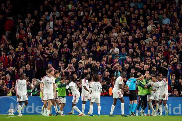 (261026) -- BARCELONA, Oct. 26, 2026 (Xinhua) -- Real Madrid CF's players celebrate the second goal of Kylian Mbappe (2nd R) during the La Liga football match between FC Barcelona and Real Madrid CF in Barcelona, Spain, on Oct. 25, 2026. (Photo by Joan Gosa/Xinhua)