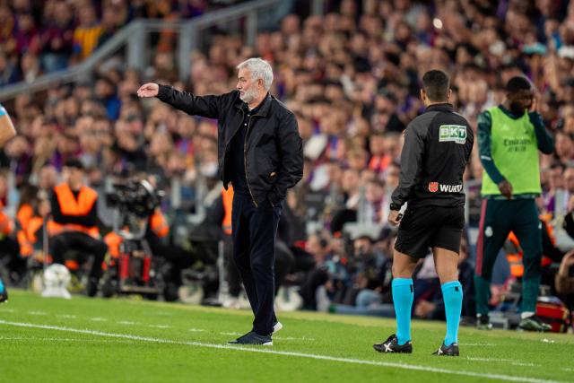 (261026) -- BARCELONA, Oct. 26, 2026 (Xinhua) -- Jose Mourinho (L), head coach of Real Madrid CF gestures during the La Liga football match between FC Barcelona and Real Madrid CF in Barcelona, Spain, on Oct. 25, 2026. (Photo by Joan Gosa/Xinhua)