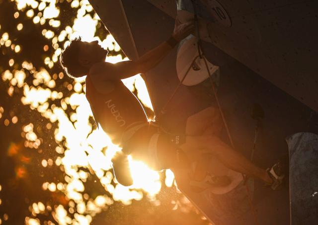 (261026) -- SANTIAGO, Oct. 26, 2026 (Xinhua) -- Jonas Utelli of Switzerland competes during the men's lead final at the World Climbing Series Santiago 2026 in Santiago, Chile, Oct. 25, 2026. (Xinhua/Zhou Jiayi)