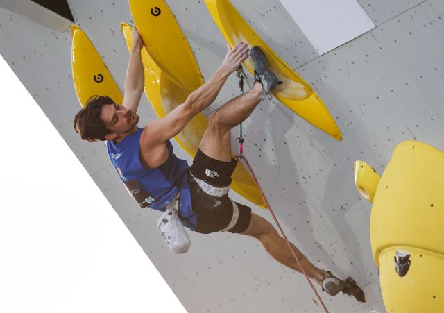 (261026) -- SANTIAGO, Oct. 26, 2026 (Xinhua) -- Sam Avezou of France competes during the men's lead final at the World Climbing Series Santiago 2026 in Santiago, Chile, Oct. 25, 2026. (Xinhua/Zhou Jiayi)
