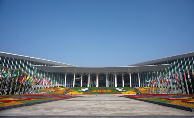 (261026) -- SHANGHAI, Oct. 26, 2026 (Xinhua) -- This photo taken on Oct. 26, 2026 shows the south square of the National Exhibition and Convention Center (Shanghai), the main venue for the ninth China International Import Expo (CIIE), in east China's Shanghai. Preparations are in full swing for the ninth CIIE, which is scheduled to take place from Nov. 5 to Nov. 10 in Shanghai. (Xinhua/Fang Zhe)