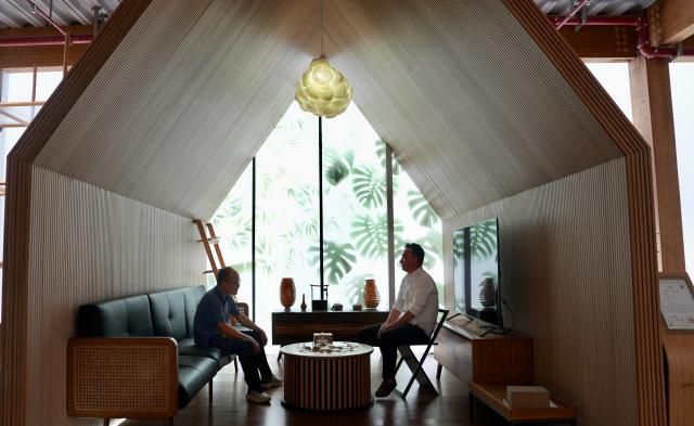(261026) -- NANCHANG, Oct. 26, 2026 (Xinhua) -- Customers experience a living room made of bamboo at a bamboo company in Shangyou County, east China's Jiangxi Province, Oct. 26, 2026. Shangyou County in east China's Jiangxi is a major bamboo-producing area. In recent years, its industrial chain has expanded into high-value-added fields such as bamboo building, bamboo fiber, and bamboo charcoal. 
   As of December 2025, the county's bamboo industry had a total output value of 883 million yuan (about 131.5 million U.S. dollars), with products exported to over 30 countries and regions. (Xinhua/Hu Chenhuan)