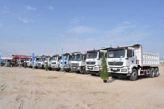 (261026) -- JAHRA GOVERNORATE, Oct. 26, 2026 (Xinhua) -- Construction vehicles are seen at the groundbreaking ceremony in Jahra Governorate, Kuwait, Oct. 26, 2026. A groundbreaking ceremony was held in Kuwait on Monday for a wastewater treatment plant undertaken by China State Construction Engineering Corporation Ltd., marking another step forward in infrastructure and environmental cooperation between China and Kuwait.
   TO GO WITH "Chinese-built wastewater treatment project breaks ground in Kuwait" (Photo by Asad/Xinhua)