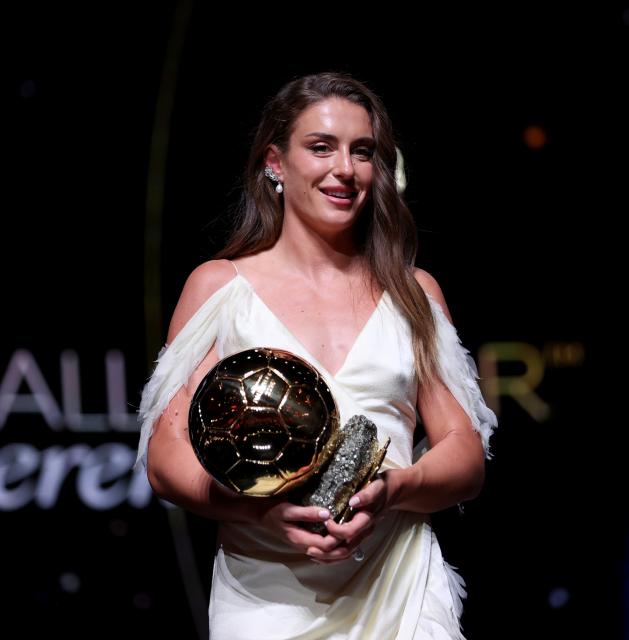 (261027) -- LONDON, Oct. 27, 2026 (Xinhua) -- London City Lionesses' Alexia Putellas reacts after winning the women's Ballon d'Or award during the 2026 Ballon d'Or Football award ceremony in London, Britain, on Oct. 26, 2026. (Xinhua/Li Ying)