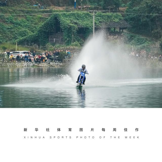 (261027) -- BEIJING, Oct. 27, 2026 (Xinhua) -- XINHUA SPORTS PHOTO OF THE WEEK (from Oct. 19 to Oct. 25, 2026) TRANSMITTED on Oct. 27, 2026. Zhang Xue rides a modified MX450 across open water in Mayang Miao Autonomous County, central China's Hunan Province, Oct. 25, 2026. Zhang Xue, founder of Chinese motorcycle manufacturer ZXMOTO, set a Guinness World Record on Sunday by riding a modified motorcycle 40.74 kilometers across open water in his hometown of Mayang Miao Autonomous County in central China's Hunan Province. (Xinhua/Chen Sihan)