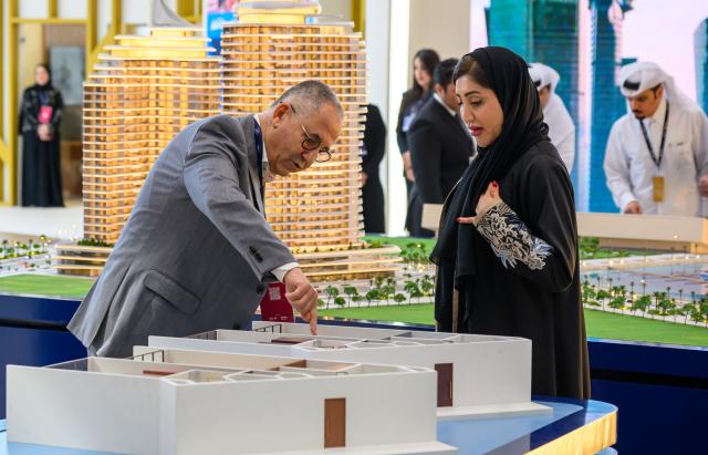 (261027) -- DOHA, Oct. 27, 2026 (Xinhua) -- People visit the Cityscape Qatar 2026 real estate exhibition at the Doha Exhibition and Convention Center in Doha, Qatar, Oct. 27, 2026.
  The exhibition kicked off here on Tuesday and runs until Oct. 29. (Photo by Nikku/Xinhua)