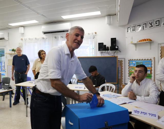 (261027) -- JERUSALEM, Oct. 27, 2026 (Xinhua) -- Yair Golan, leader of The Democrats party, casts his ballot at a polling station in Rosh HaAyin, central Israel, on Oct. 27, 2026. Voting in Israel's parliamentary election began at 7 a.m. local time (0500 GMT) on Tuesday, with Prime Minister Benjamin Netanyahu's political future in focus. (Photo by Gil Cohen Magen/Xinhua)