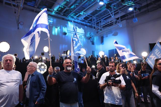 (261027) -- TEL AVIV, Oct. 27, 2026 (Xinhua) -- A bloc of parties led by former military chief Gadi Eisenkot won 53 seats in Israel's 120-member parliament, ahead of Prime Minister Benjamin Netanyahu's right-wing bloc with 50 seats, according to an exit poll released Tuesday night by Israel's public broadcaster Kan.
Neither bloc secured the 61 seats needed to form an outright majority government. This photo taken on Oct. 27, 2026 shows supporters of Gadi Eisenkot at the centrist Yashar party campaign headquarters in Tel Aviv, Israel. (Xinhua/Zhang Haobo)