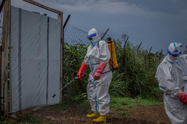 (261027) -- RWAMPARA, Oct. 27, 2026 (Xinhua) -- A medical worker conducts disinfection in Rwampara, Ituri Province in the Democratic Republic of the Congo, Oct. 27, 2026. Ebola cases in the Democratic Republic of the Congo (DRC) have surpassed 10,000, marking a grim milestone in what has become the world's second-largest recorded Ebola outbreak.
   The latest figures released Tuesday by the country's health authorities showed that the country had recorded a total of 10,060 confirmed cases, including 4,887 deaths, as of Oct. 25, with the fatality rate at 48.6 percent. (Str/Xinhua)