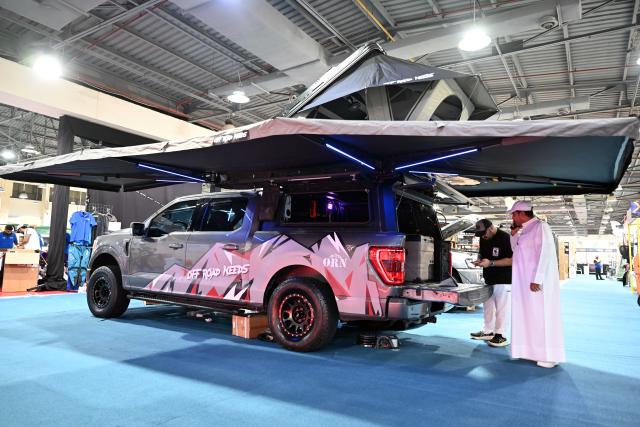 (261027) -- HAWALLI GOVERNORATE, Oct. 27, 2026 (Xinhua) -- People visit an international exhibition featuring camping, marine activities and outdoor sports in Hawalli Governorate, Kuwait, Oct. 27, 2026. The five-day exhibition brings together more than 100 local, regional and international exhibitors, showcasing over 500 brands and more than 20,000 products. (Photo by Asad/Xinhua)