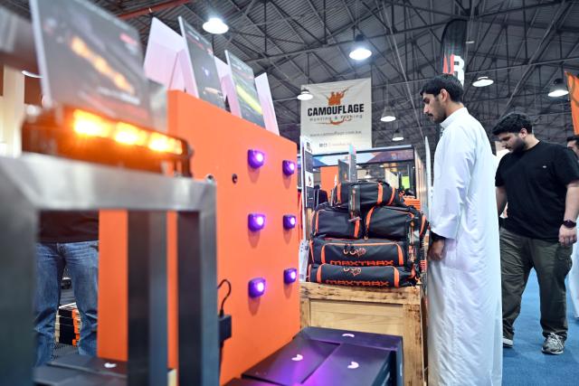 (261027) -- HAWALLI GOVERNORATE, Oct. 27, 2026 (Xinhua) -- People visit an international exhibition featuring camping, marine activities and outdoor sports in Hawalli Governorate, Kuwait, Oct. 27, 2026. The five-day exhibition brings together more than 100 local, regional and international exhibitors, showcasing over 500 brands and more than 20,000 products. (Photo by Asad/Xinhua)