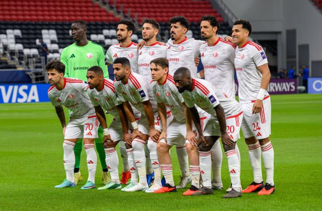 (261028) -- AL KHOR, Oct. 28, 2026 (Xinhua) -- Starting players of Al Shamal SC pose for a group photo ahead of the AFC Champions League Elite football match between Qatar's Al Shamal SC and Saudi Arabia's Al Hilal SFC at Al Bayt Stadium, Al Khor, Qatar, Oct. 27, 2026. (Photo by Nikku/Xinhua)