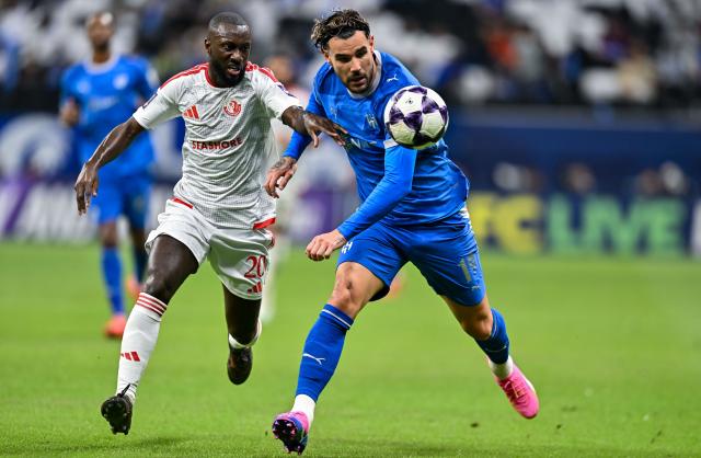 (261028) -- AL KHOR, Oct. 28, 2026 (Xinhua) -- Youssouf Sabaly (L) of Al Shamal SC vies with Theo Hernandez of Al Hilal SFC during the AFC Champions League Elite football match between Qatar's Al Shamal SC and Saudi Arabia's Al Hilal SFC at Al Bayt Stadium, Al Khor, Qatar, Oct. 27, 2026. (Photo by Nikku/Xinhua)