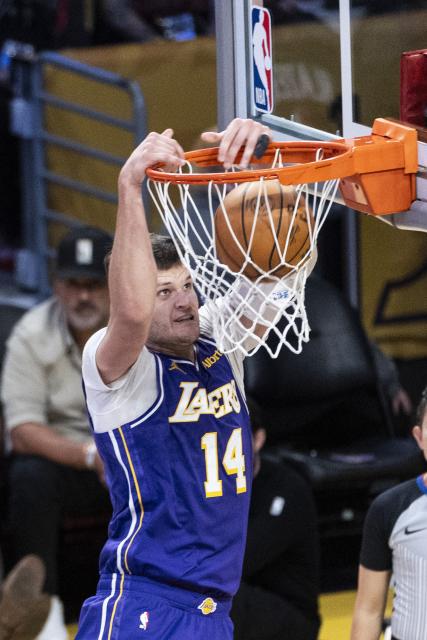 (261028) -- LOS ANGELES, Oct. 28, 2026 (Xinhua) -- Walker Kessler of Los Angeles Lakers dunks during the NBA basketball game between Los Angeles Lakers and Portland Trail Blazers in Los Angeles, the United States, Oct. 27, 2026. (Photo by Ringo Chiu/Xinhua)