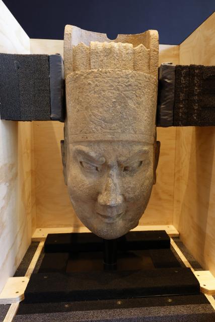 (261028) -- CANBERRA, Oct. 28, 2026 (Xinhua) -- This photo taken on Oct. 28, 2026 shows the head of a military official statue, a Chinese cultural relic dating back to the Northern Song Dynasty (960-1127), returned from Australia, in Canberra, Australia. The National Gallery of Australia (NGA) handed over two Chinese cultural relics to China's National Cultural Heritage Administration in Canberra at 2:52 p.m. local time on Wednesday.
  According to the NGA, both relics are made of limestone and originated from central China's Henan Province. (Photo by Chu Chen/Xinhua)