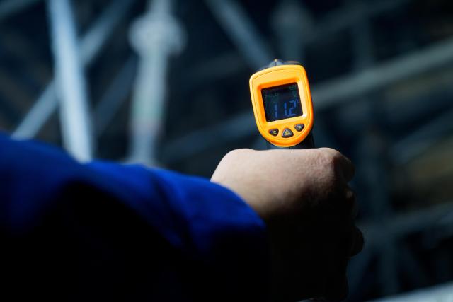 (261028) -- QIQIHAR, Oct. 28, 2026 (Xinhua) -- A worker checks indoor temperature at a construction site of the Fuyu-Jiagedaqi Railway upgrading project in northeast China's Heilongjiang Province, Oct. 27, 2026. Various measures have been adopted to tackle difficulties in railway construction amid low temperatures, and to ensure that the project advance in an efficient and orderly manner. 
   This railway serves as a critical artery connecting the Greater Khingan Mountains and the outer world. (Xinhua/Zhang Tao)