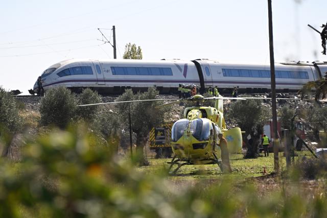 (261028) -- MADRID, Oct. 28, 2026 (Xinhua) -- This photo taken on Oct. 28, 2026 shows the site of high-speed train collision in Toledo province, Spain.
  At least 64 were killed in a train accident that occurred on Wednesday in the Spanish province of Toledo, south of Madrid, local authorities confirmed. (Xinhua/Cheng Min)