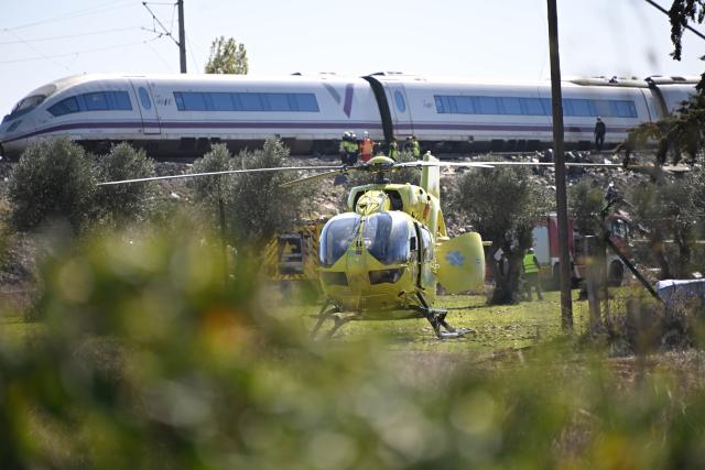 (261028) -- MADRID, Oct. 28, 2026 (Xinhua) -- This photo taken on Oct. 28, 2026 shows the site of high-speed train collision in Toledo province, Spain.
  At least 64 were killed in a train accident that occurred on Wednesday in the Spanish province of Toledo, south of Madrid, local authorities confirmed. (Xinhua/Cheng Min)