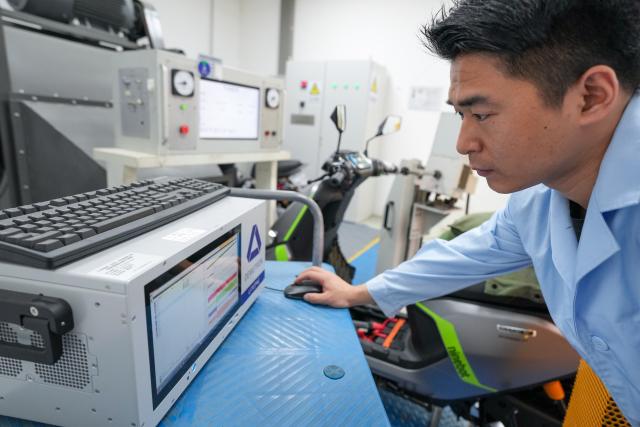 (261028) -- NANJING, Oct. 28, 2026 (Xinhua) -- An engineer conducts endurance tests on a two-wheeler at a smart electric two-wheeler company in Changzhou, east China's Jiangsu Province, Oct. 14, 2026.
  In recent years, Changzhou City has leveraged its traditional strengths in manufacturing to accelerate the clustering of electric two-wheeler manufacturers and their component suppliers, aiming at development of more smart and high-end products. 
  The city now accounts for about 10 percent of China's output of electric two-wheelers and has established a complete industrial chain spanning from parts to general assembly. 
  Changzhou has also actively reinforced the technological innovation as the main driver of the industry, as local makers keep boosting R&D efforts to further improve their products. (Xinhua/Li Bo)