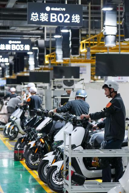 (261028) -- NANJING, Oct. 28, 2026 (Xinhua) -- Workers check vehicles on the final assembly line at a smart electric two-wheeler company in Changzhou, east China's Jiangsu Province, Oct. 14, 2026.
  In recent years, Changzhou City has leveraged its traditional strengths in manufacturing to accelerate the clustering of electric two-wheeler manufacturers and their component suppliers, aiming at development of more smart and high-end products. 
  The city now accounts for about 10 percent of China's output of electric two-wheelers and has established a complete industrial chain spanning from parts to general assembly. 
  Changzhou has also actively reinforced the technological innovation as the main driver of the industry, as local makers keep boosting R&D efforts to further improve their products. (Xinhua/Li Bo)