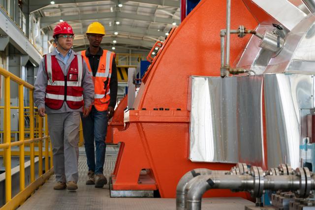 (261028) -- NAKURU, Oct. 28, 2026 (Xinhua) -- Staff members inspect the equipment at Olkaria I Geothermal Power Plant at Hell's Gate National Park in Nakuru County, Kenya, Oct. 19, 2026. TO GO WITH "Feature: Chinese firm helps upgrade Africa's first geothermal power plant in Kenya" (Xinhua/Xie Jianfei)