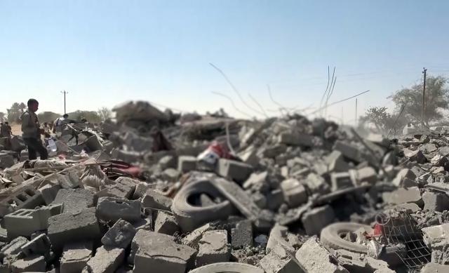 (261028) -- AL-JAWF PROVINCE, Oct. 28, 2026 (Xinhua) -- This handout screenshot provided by Houthi Media Center shows residents inspecting the scene following Saudi airstrikes that targeted a market in Al-Jawf province, Yemen, Oct. 28, 2026. At least 14 people were killed and 10 others wounded in Saudi airstrikes that hit a market and a fuel station in Yemen's northern province of Al-Jawf on Wednesday, Houthi-run al-Masirah TV reported. (Houthi Media Center/Handout via Xinhua)
