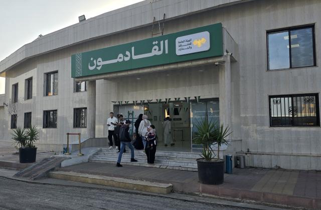 (261028) -- DAMASCUS, Oct. 28, 2026 (Xinhua) -- Travelers enter a passenger terminal at the Nasib border crossing between Syria and Jordan in Daraa province, southern Syria, Oct. 28, 2026. Syria and Jordan have agreed to establish a joint security committee to investigate recent Jordanian airstrikes on southern Syria, as the Nasib border crossing between the two countries reopened Wednesday following a temporary closure, Syrian state media reported. (Str/Xinhua)
