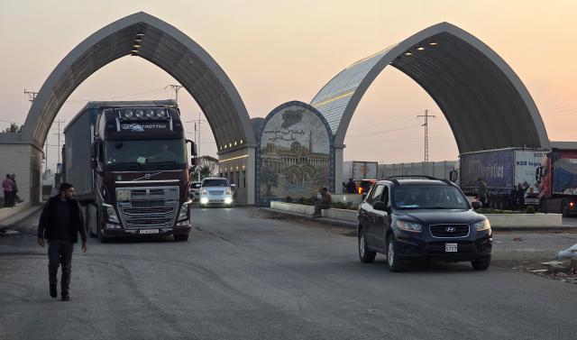 (261028) -- DAMASCUS, Oct. 28, 2026 (Xinhua) -- Vehicles and trucks are seen at the Nasib border crossing between Syria and Jordan in Daraa province, southern Syria, Oct. 28, 2026. Syria and Jordan have agreed to establish a joint security committee to investigate recent Jordanian airstrikes on southern Syria, as the Nasib border crossing between the two countries reopened Wednesday following a temporary closure, Syrian state media reported. (Str/Xinhua)