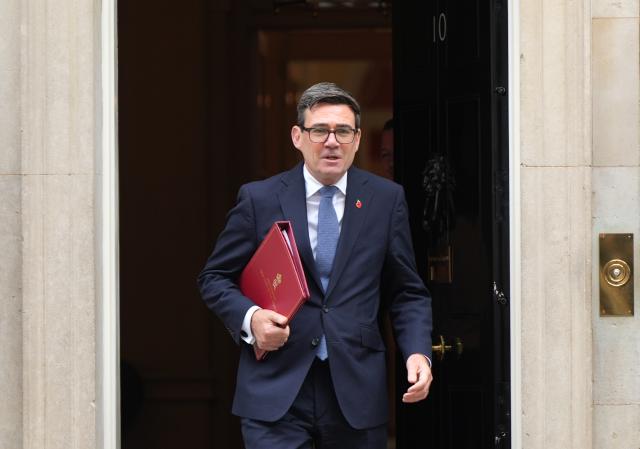 (261029) -- LONDON, Oct. 29, 2026 (Xinhua) -- British Prime Minister Andy Burnham walks out of 10 Downing Street in London, Britain, Oct. 28, 2026. Britain would provide 10 billion pounds (13 billion U.S. dollars) of additional economic and military support to Ukraine, said British Chancellor of the Exchequer John Healey on Wednesday. (Xinhua/Zhang Feng)