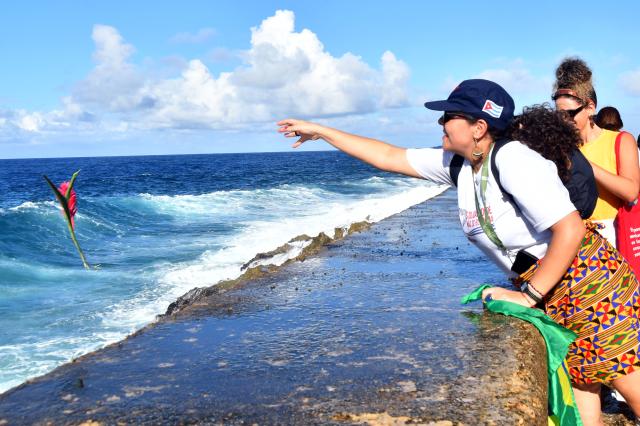 (261029) -- HAVANA, Oct. 29, 2026 (Xinhua) -- A woman throws flowers into the sea during a ceremony commemorating Camilo Cienfuegos in Havana, capital of Cuba, on Oct. 28, 2026. Cuba marked the 67th anniversary of the death of Camilo Cienfuegos. Cienfuegos, along with Fidel Castro and Che Guevara, are the three chief commanders of the Cuban revolution. He died in a flight accident at the age of 27. (Photo by Joaquin Hernandez/Xinhua)